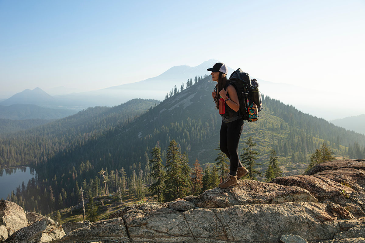 Woman Hiking In Mountains