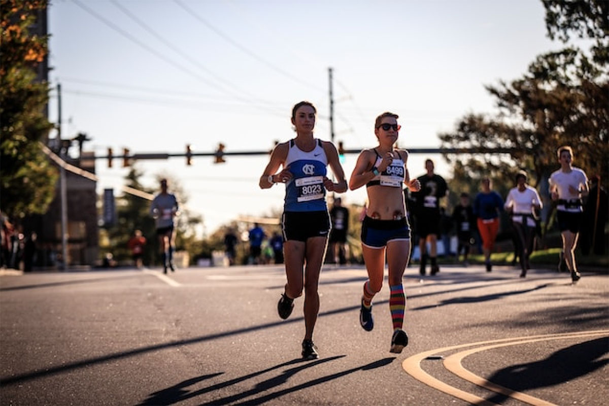 Women Running On Track